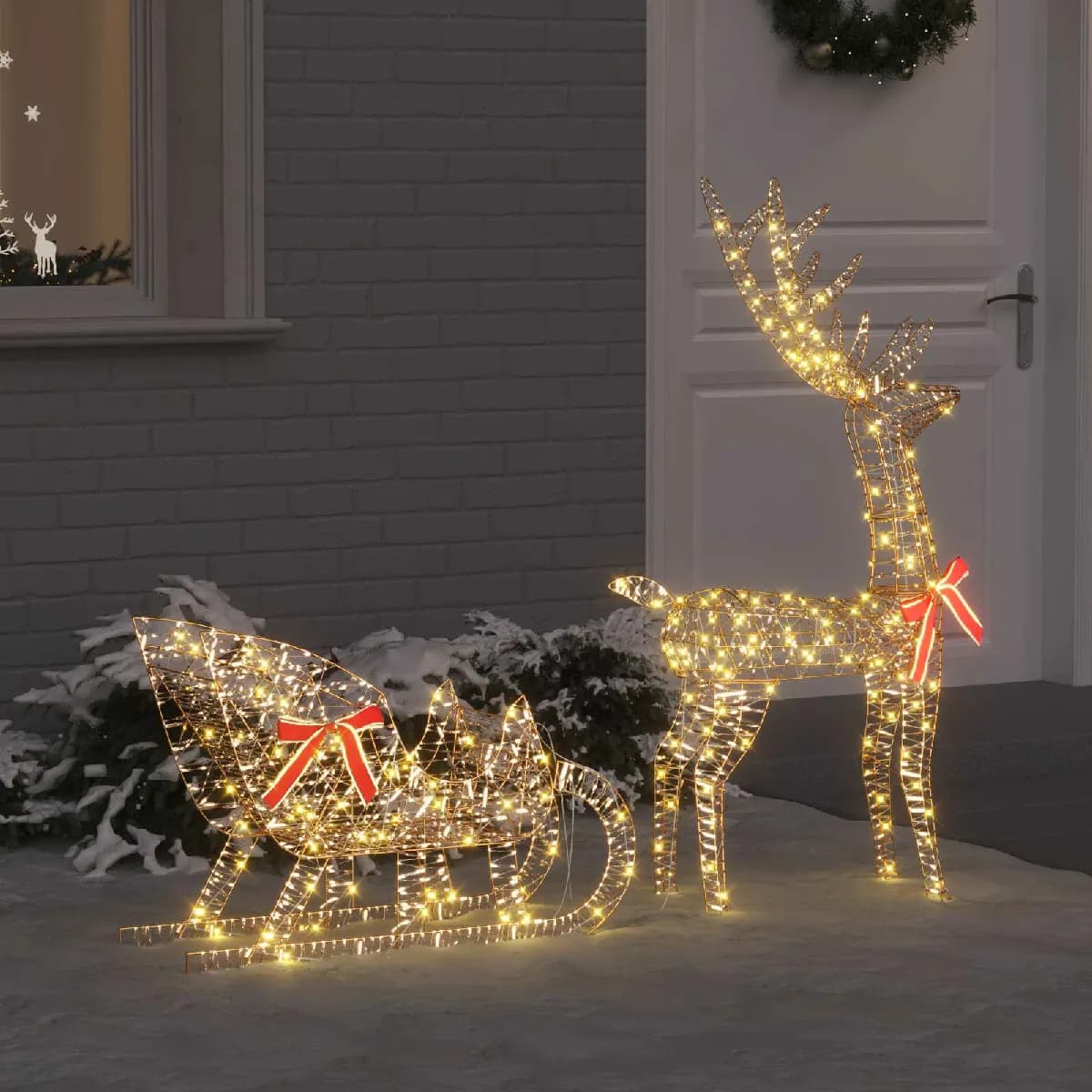 vidaXL Traîneau tiré par un renne Blanc chaud 70 x 26 x 129 cm PET